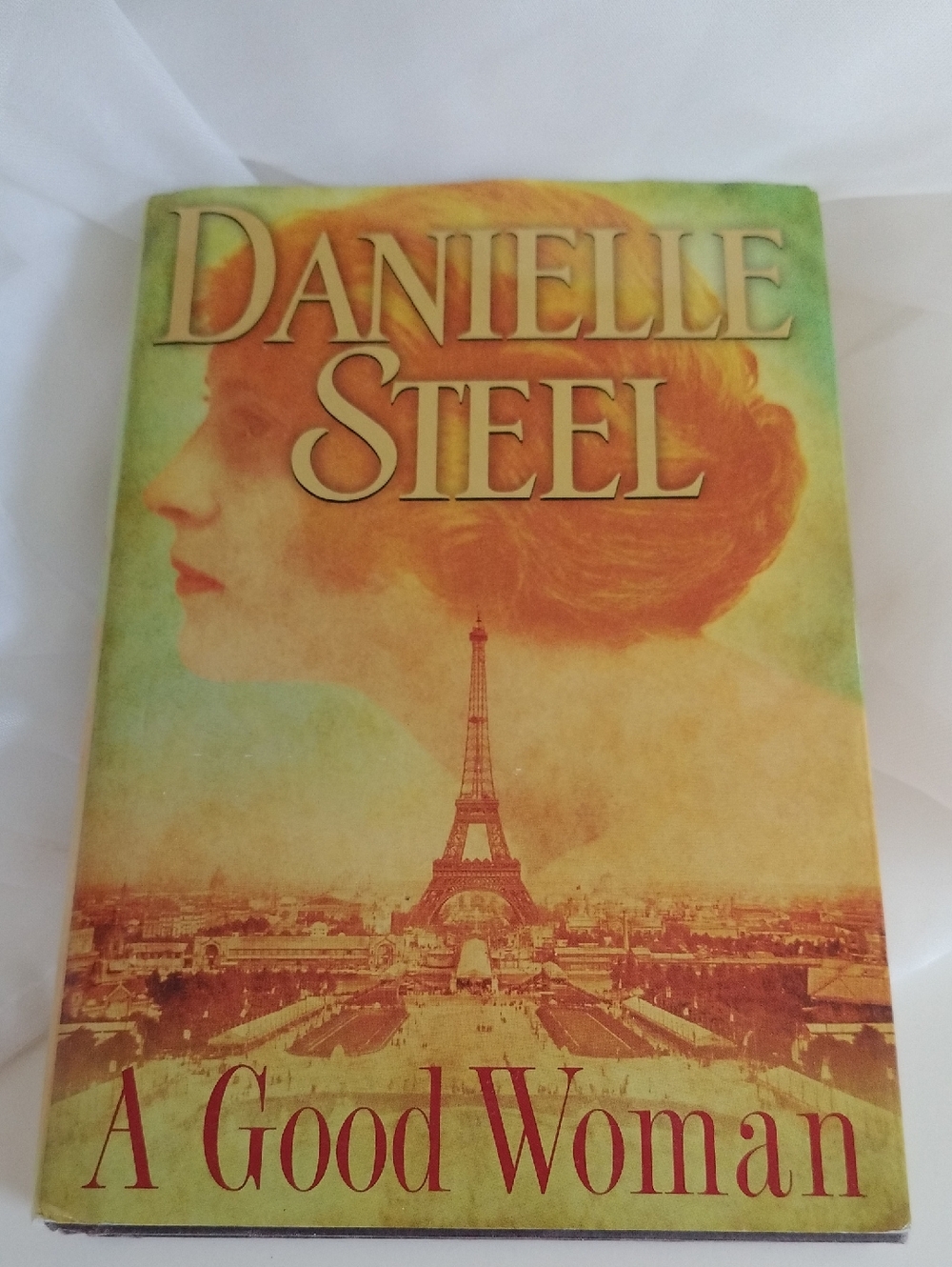 Danielle Steel "A Good Woman" Hardcover Book - Yellow & Orange Cover